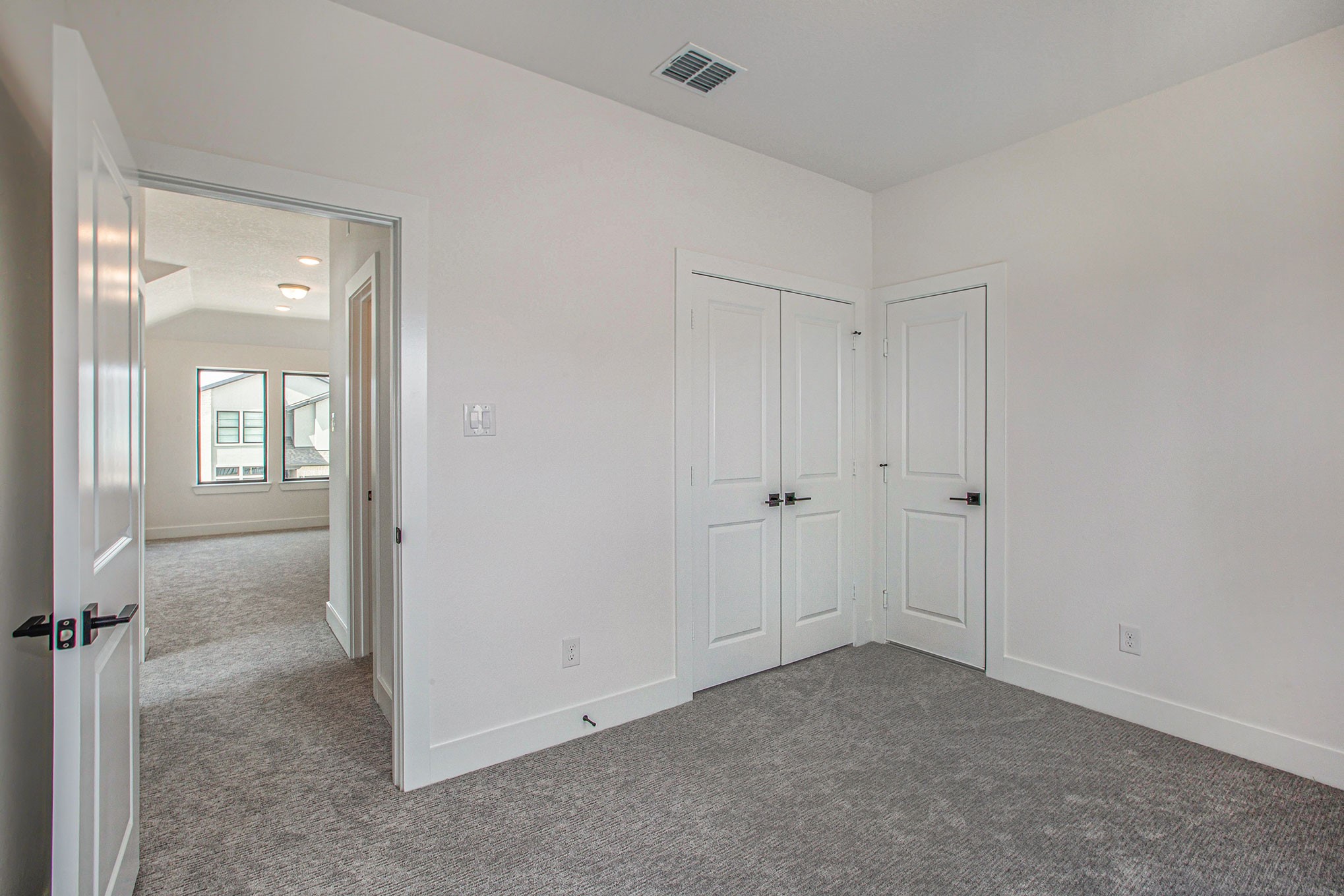 15018 Bonham Shore Drive Cypress, TX 77433 - Photo 26 of 31 a view of an empty room with closet and a bathroom