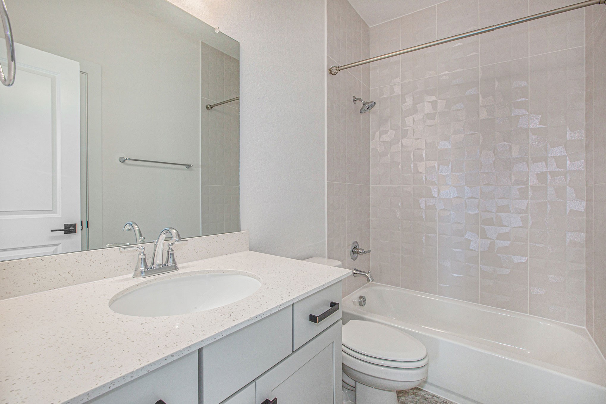 15018 Bonham Shore Drive Cypress, TX 77433 - Photo 28 of 31 a bathroom with a sink toilet and shower