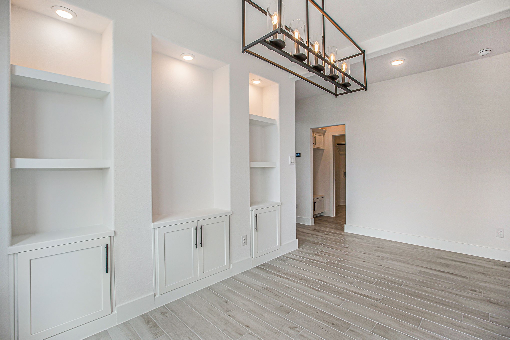 15018 Bonham Shore Drive Cypress, TX 77433 - Photo 5 of 31 a view of a hallway with wooden floor
