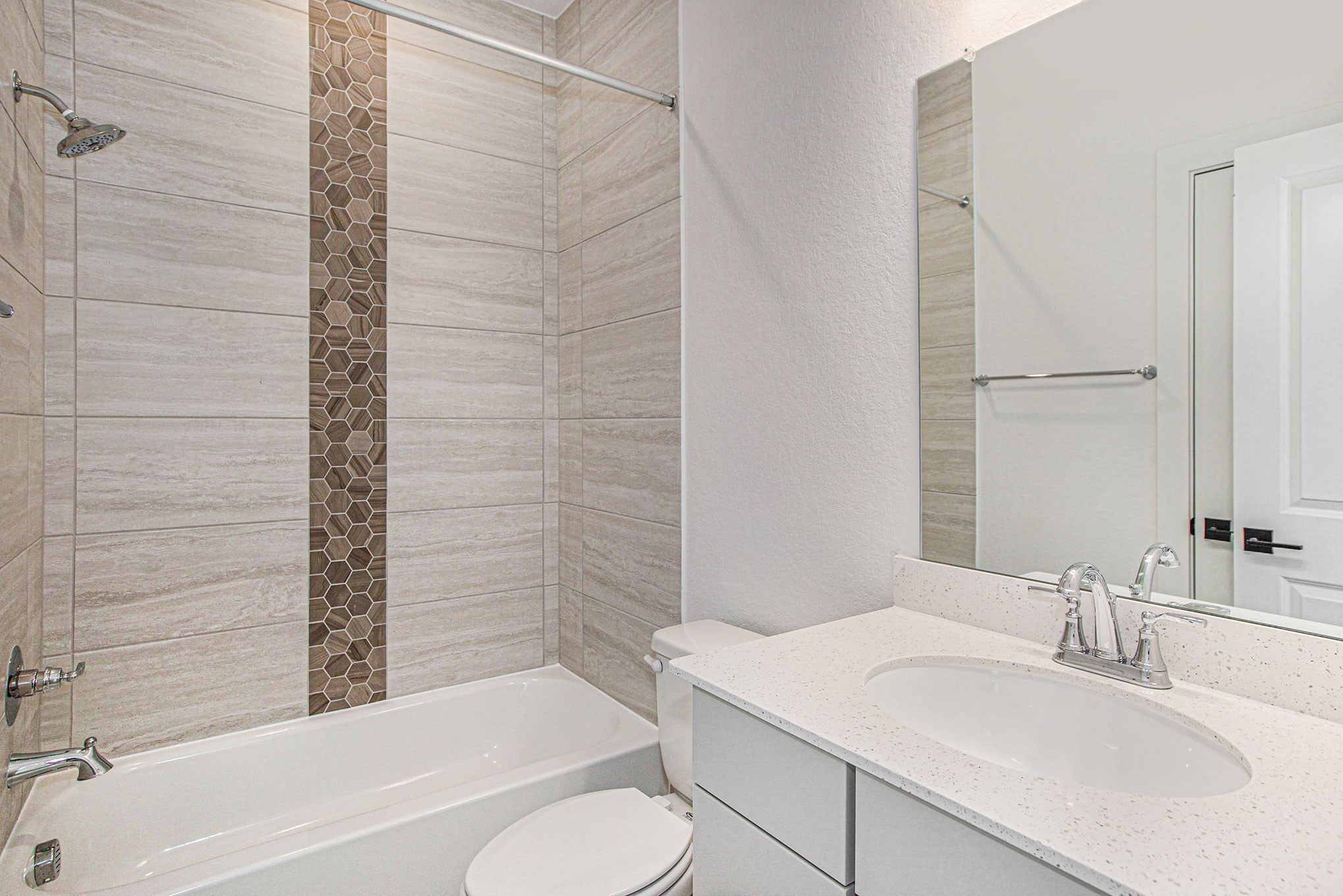 15018 Bonham Shore Drive Cypress, TX 77433 - Photo 7 of 31 a bathroom with a sink toilet vanity and shower