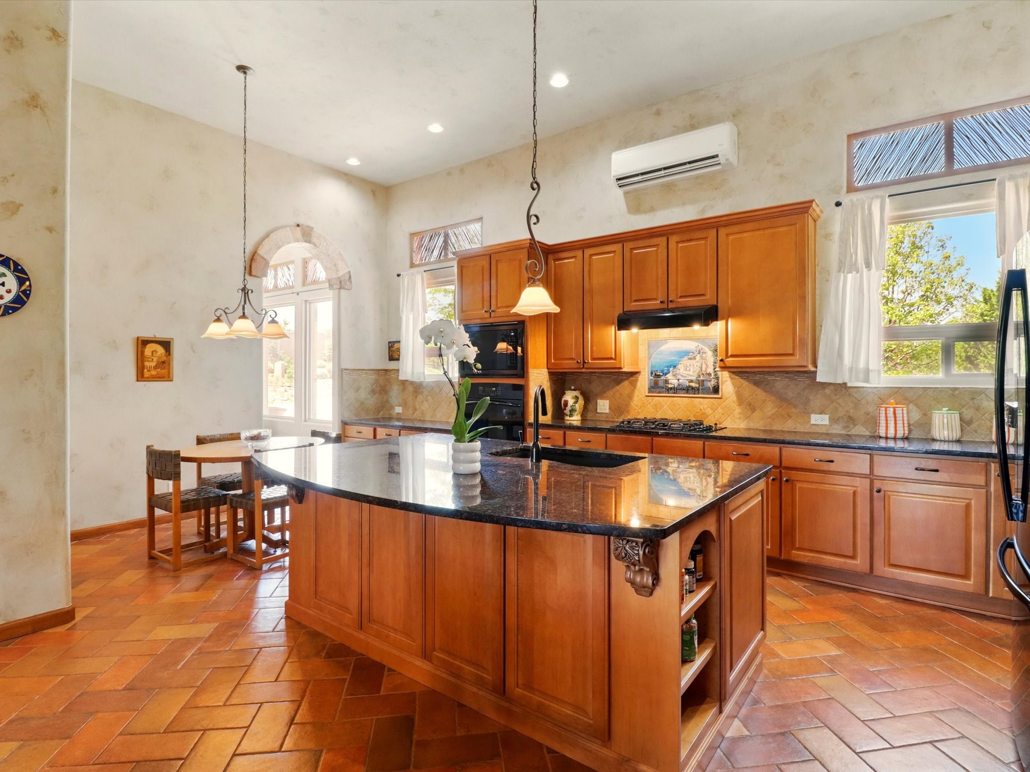 97 East Chili Line Road Santa Fe, NM 87508 - Photo 1 of 1 KITCHEN AREA WITH BREAKFAST COUNTER