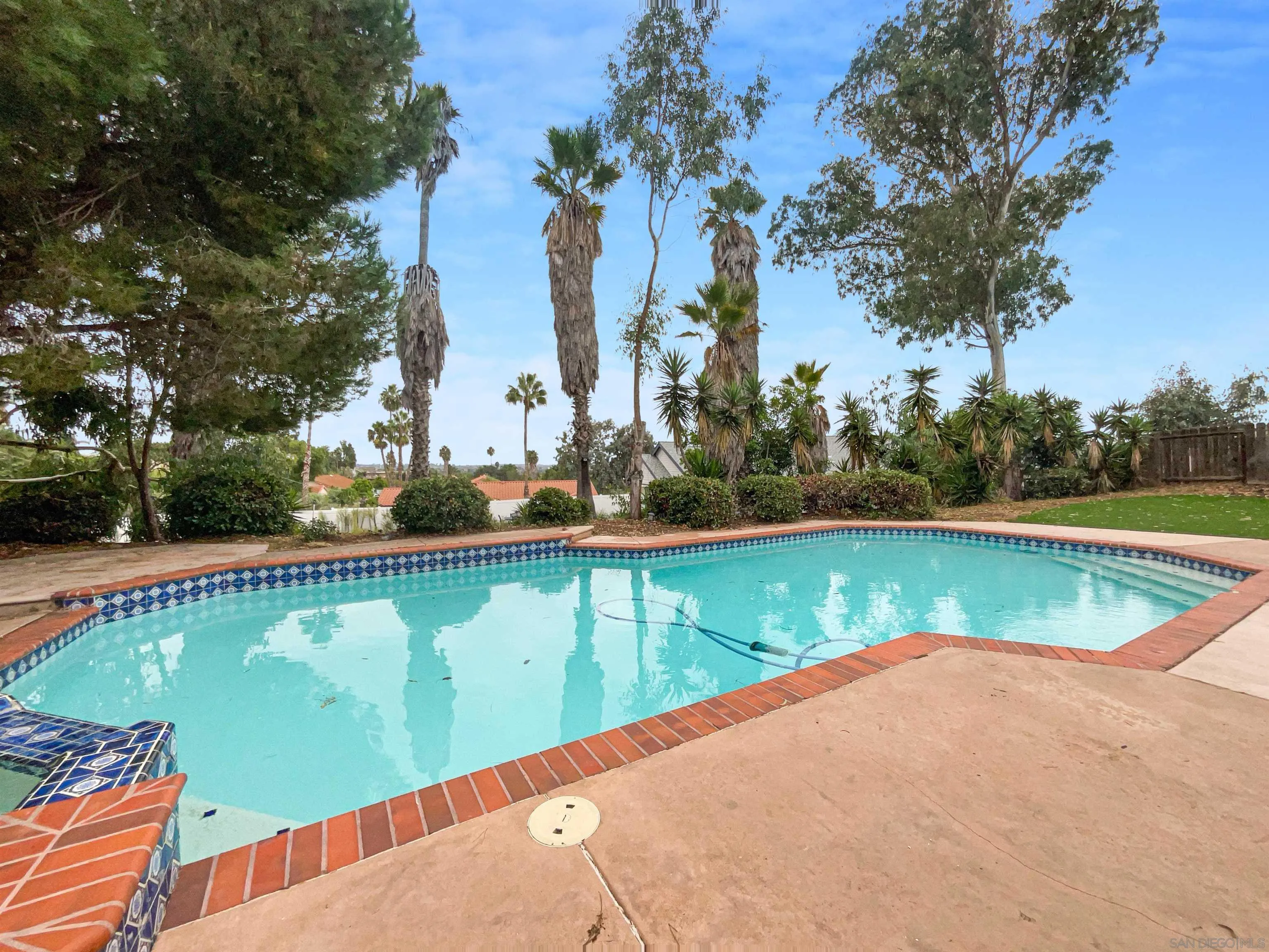 350 Whispering Brook Drive Vista, CA 92083 - Photo 7 of 17 a view of a swimming pool with a yard