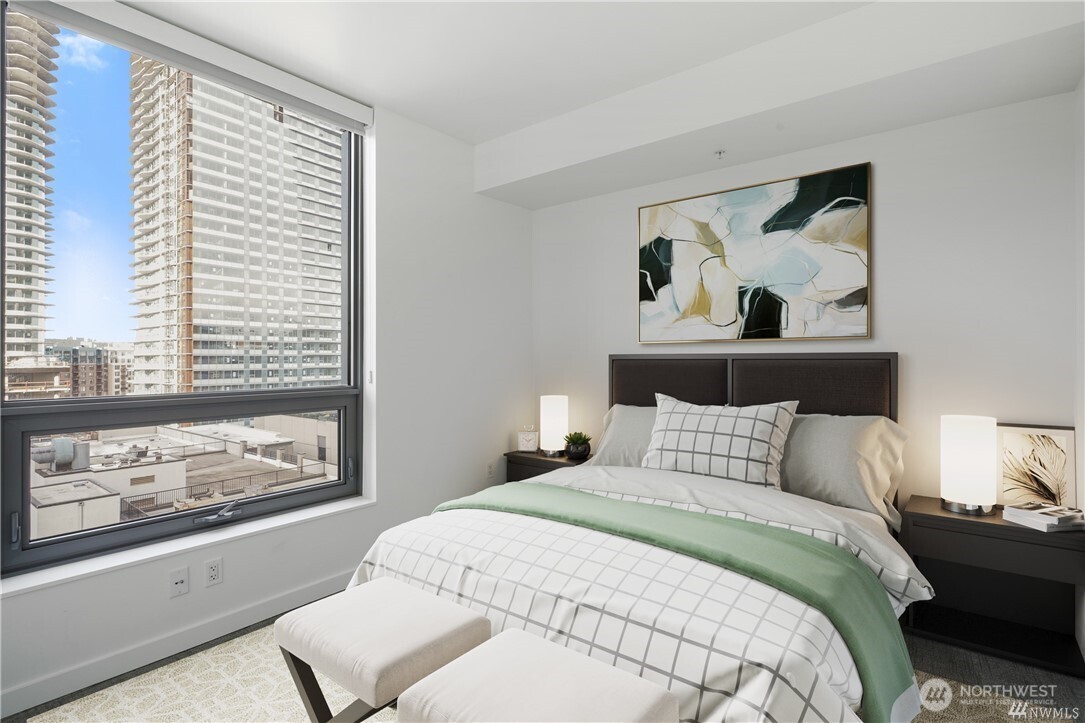 1808 Minor Avenue, Unit 905 Seattle, WA 98101 - Photo 6 of 33 a bedroom with a bed and a painting on the wall