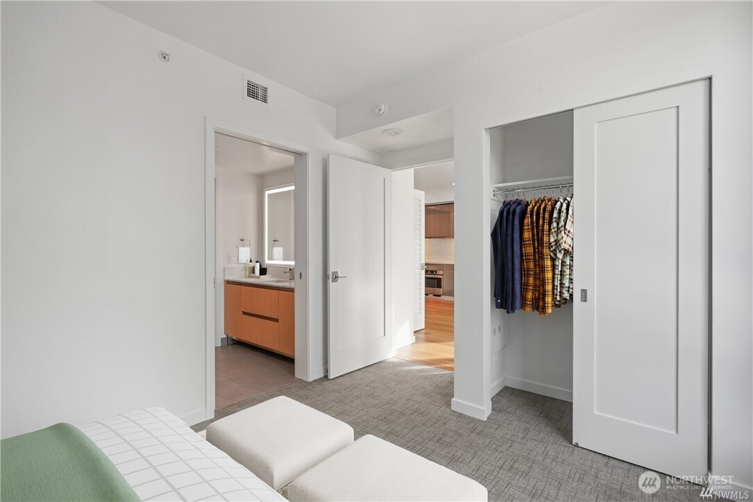 1808 Minor Avenue, Unit 905 Seattle, WA 98101 - Photo 7 of 33 a living room with furniture and a walk in closet