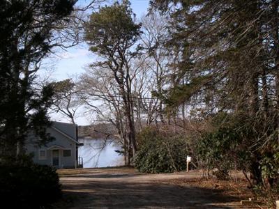 68 Old Farm Road Centerville, MA 02632 - Photo 1 of 7 a view of street along with trees