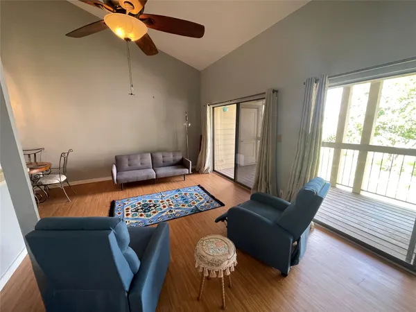 a view of a storage and utility room with washer and dryer