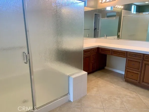 a room with a cabinets and a sink