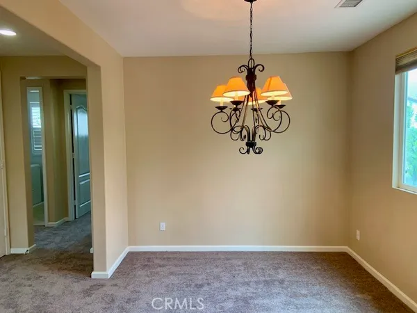 a view of a chandelier in a room