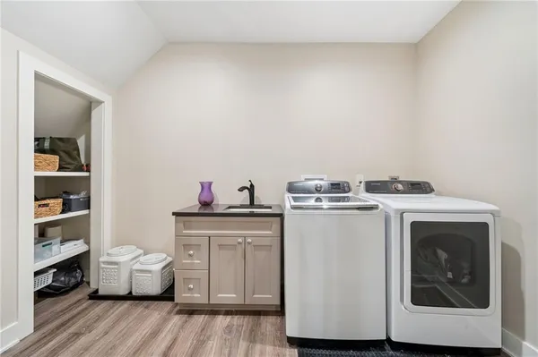 a utility room with dryer and washer