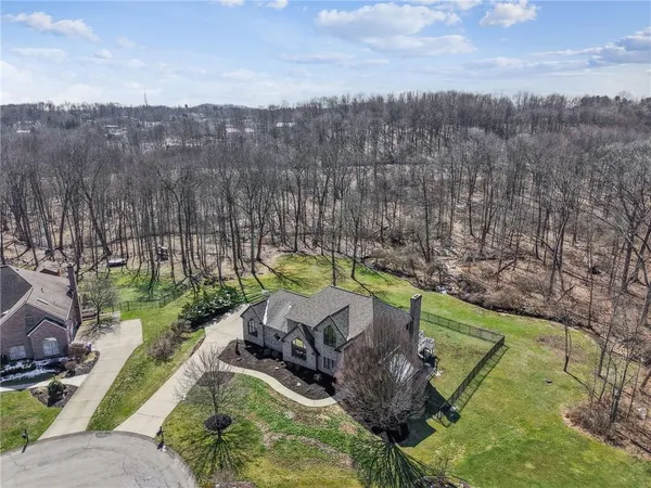 a view of a backyard with green space