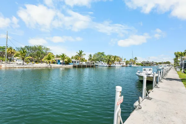 a terrace with outdoor seating and city view