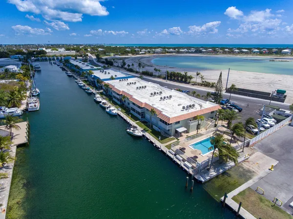 swimming pool view with a lake view in back