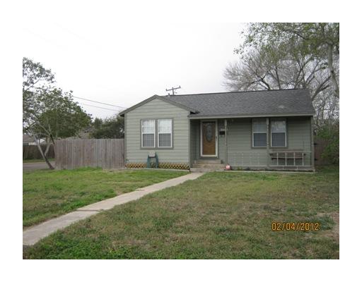 3461 Lawnview Street Corpus Christi, TX 78411 - Photo 1 of 10 a front view of a house with a garden