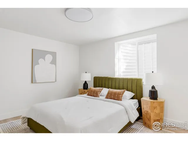 a bathroom with shower and mirror