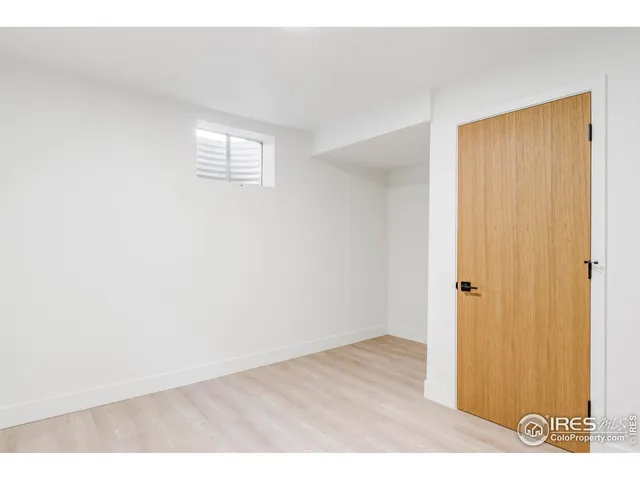 a view of house with backyard and outdoor seating