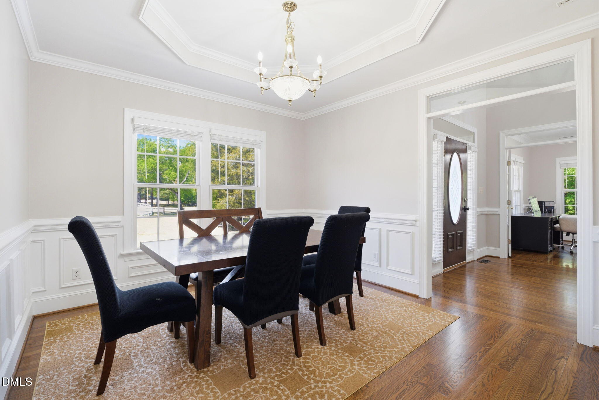 5416 Pulley Town Road Zebulon, NC 27597 - Photo 23 of 74 a view of a dining room with furniture and wooden floor