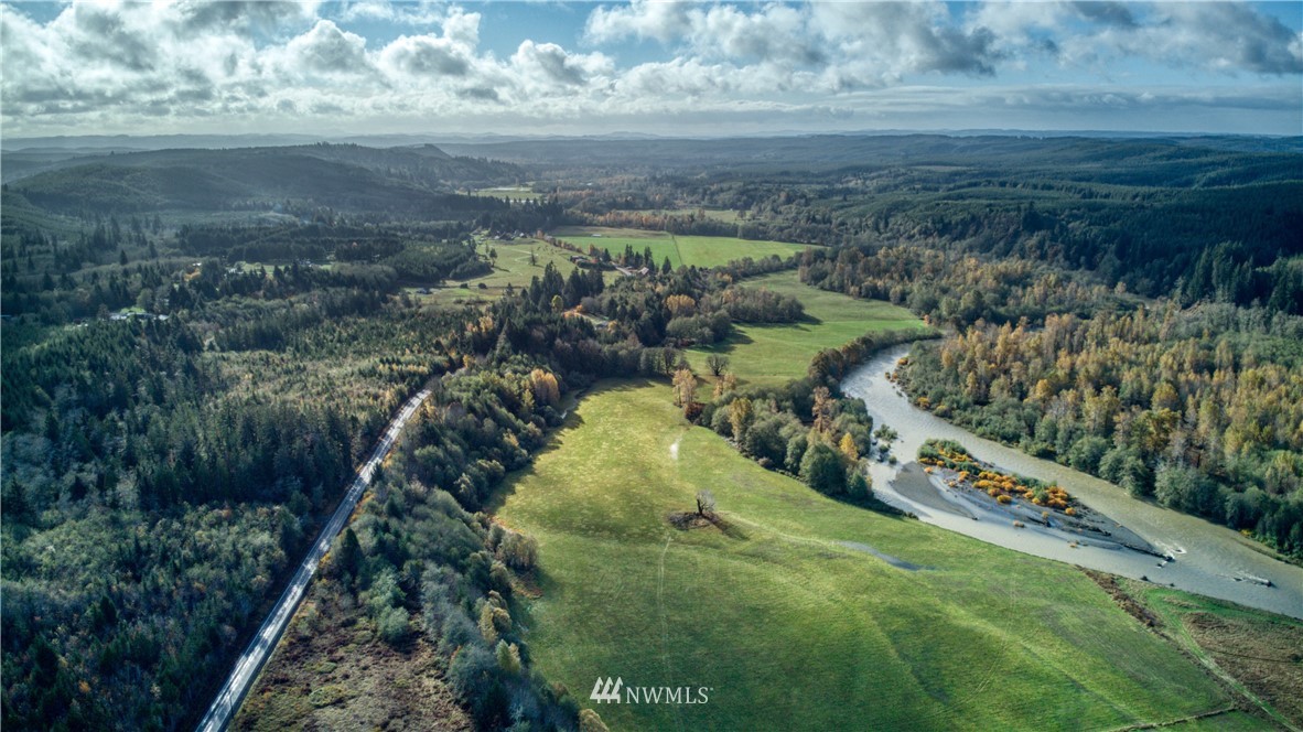 1381 Wynoochee Valley Road Montesano, WA 98563 - Photo 2 of 40 a view of a yard with an ocean view