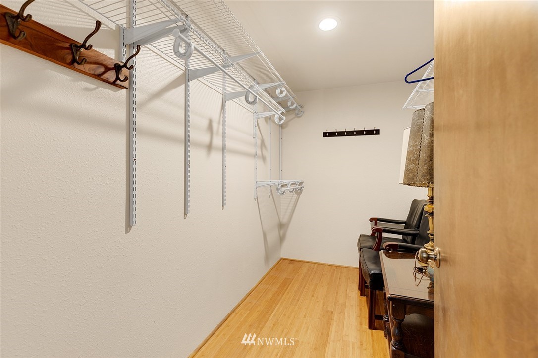 1381 Wynoochee Valley Road Montesano, WA 98563 - Photo 21 of 40 a view of a room with wooden floor and white walls