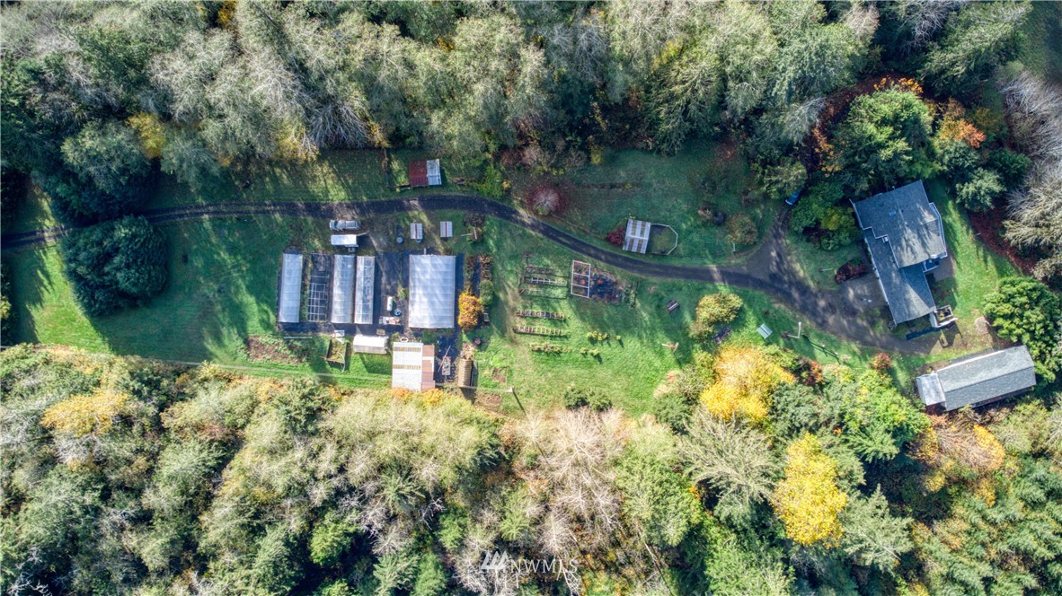 1381 Wynoochee Valley Road Montesano, WA 98563 - Photo 26 of 40 an aerial view of residential house with outdoor space and trees all around