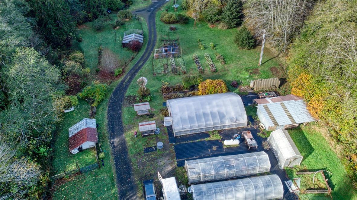 1381 Wynoochee Valley Road Montesano, WA 98563 - Photo 28 of 40 an aerial view of a house with a yard