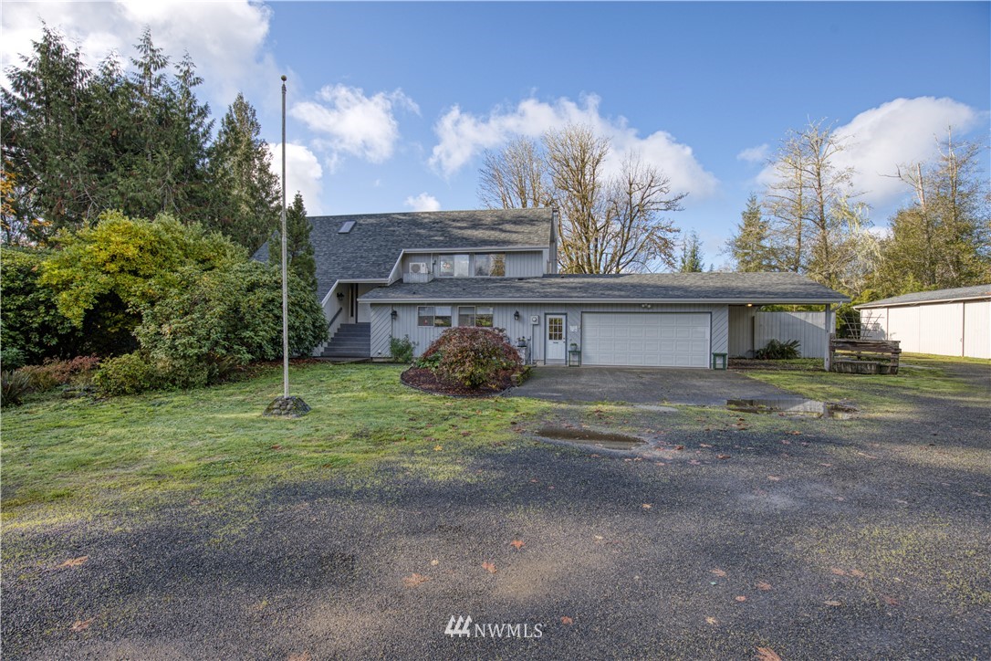 1381 Wynoochee Valley Road Montesano, WA 98563 - Photo 29 of 40 a view of a house with a back yard