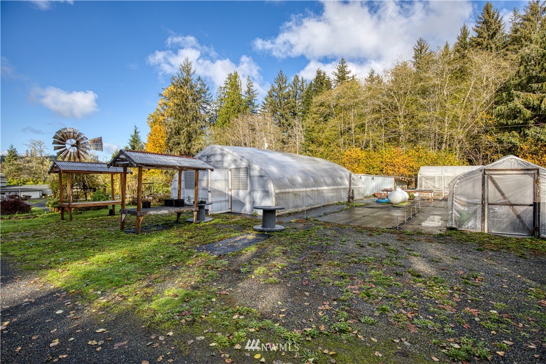 1381 Wynoochee Valley Road Montesano, WA 98563 - Photo 30 of 40 a view of an house with backyard space and balcony
