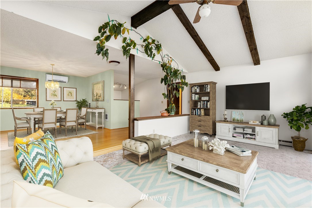 1381 Wynoochee Valley Road Montesano, WA 98563 - Photo 4 of 40 a living room with furniture and a flat screen tv