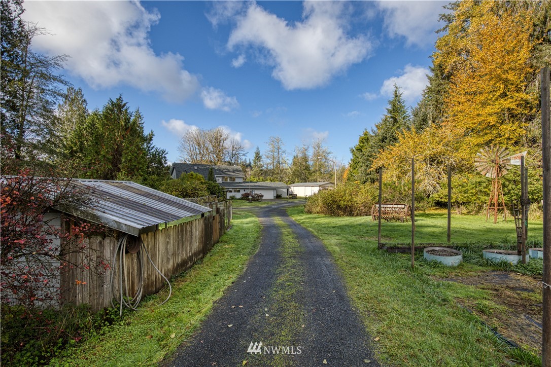 1381 Wynoochee Valley Road Montesano, WA 98563 - Photo 36 of 40 a view of a house with a yard