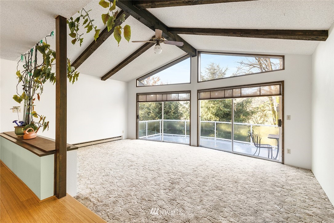 1381 Wynoochee Valley Road Montesano, WA 98563 - Photo 5 of 40 a view of a room with wooden floor and iron walls