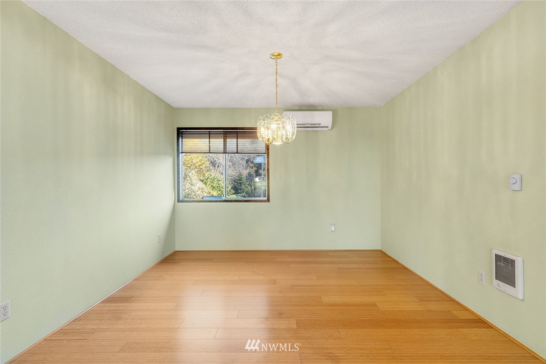 1381 Wynoochee Valley Road Montesano, WA 98563 - Photo 6 of 40 a view of a room with a wooden floor and chandelier
