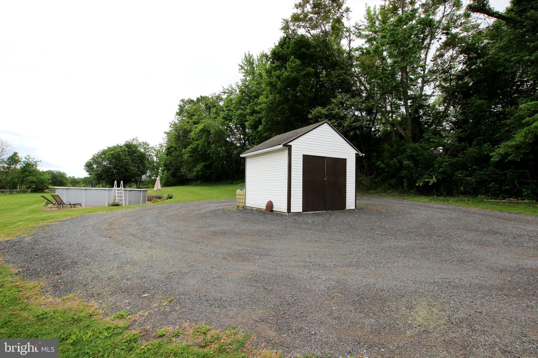 10011 Charles Town Road Ranson, WV 25438 - Photo 36 of 42 Storage Shed and Pool