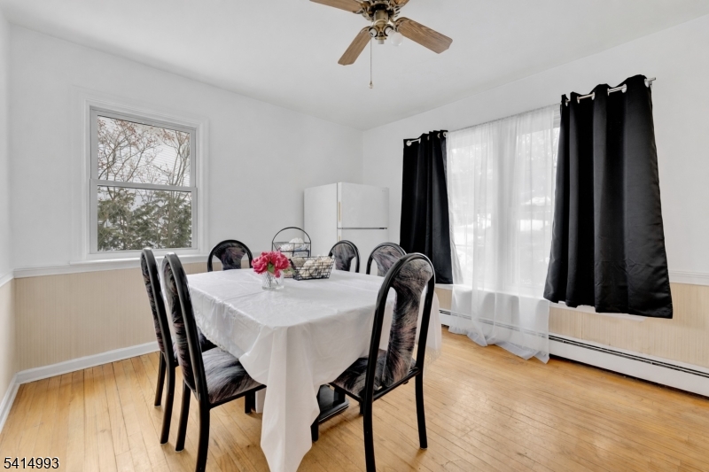 627 East Vail Road Landing, NJ 07850 - Photo 3 of 26 a view of a dining room with furniture and a window