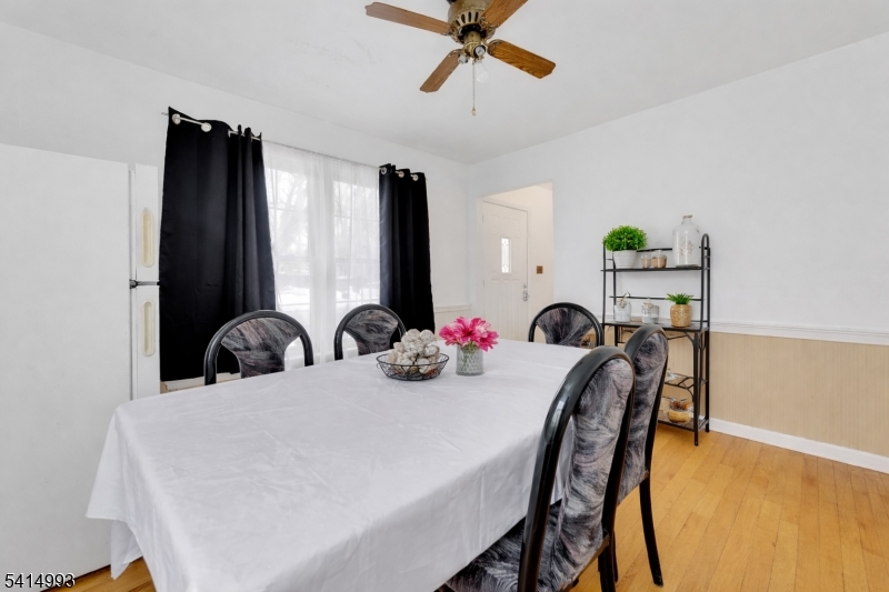 627 East Vail Road Landing, NJ 07850 - Photo 4 of 26 a view of a dining room with furniture and window