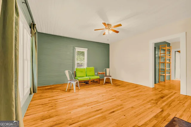 a room with a bed and a window