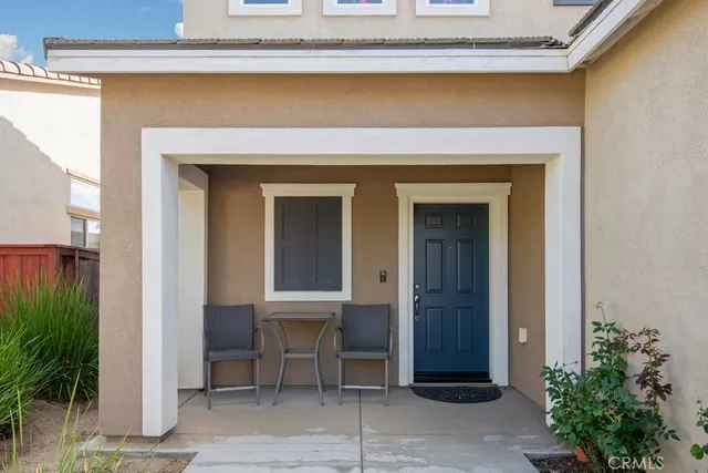 a front view of a house with a porch