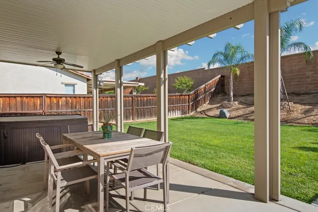 a view of a patio with a backyard