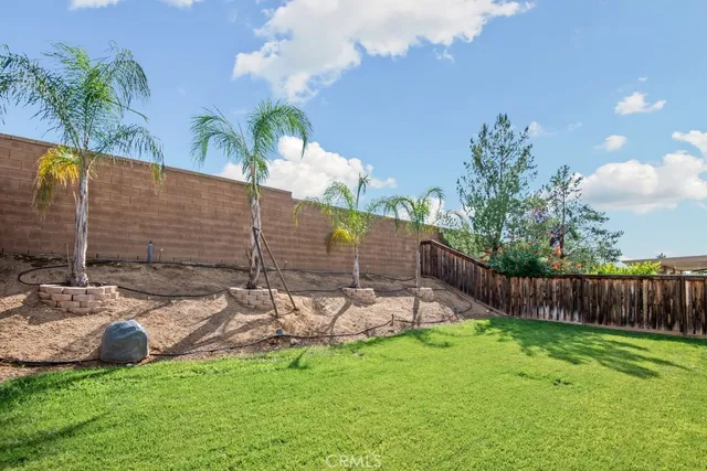 a view of a backyard with a garden