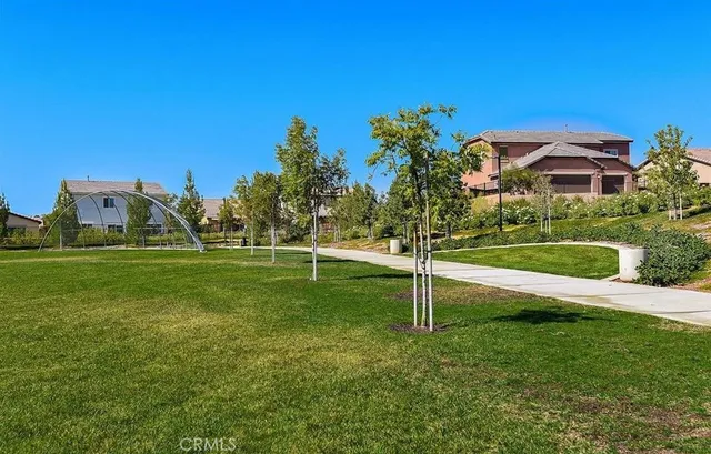 a view of yard with residential house and outdoor space