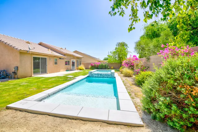 a view of house with garden