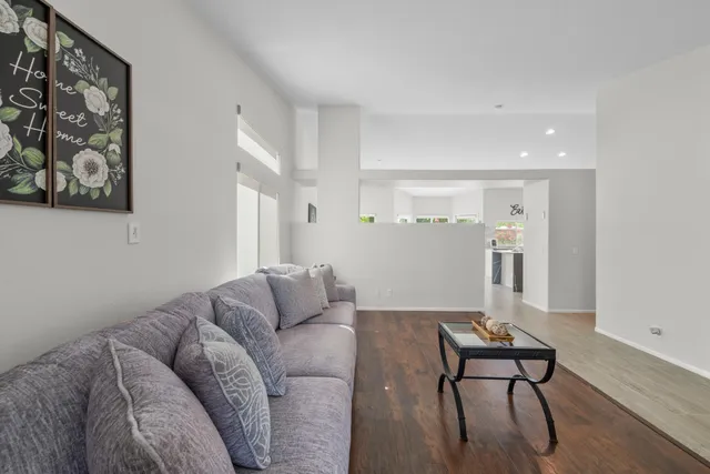 a living room with furniture and a couch