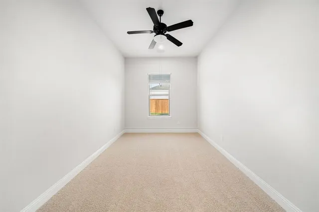a view of a kitchen with cabinets
