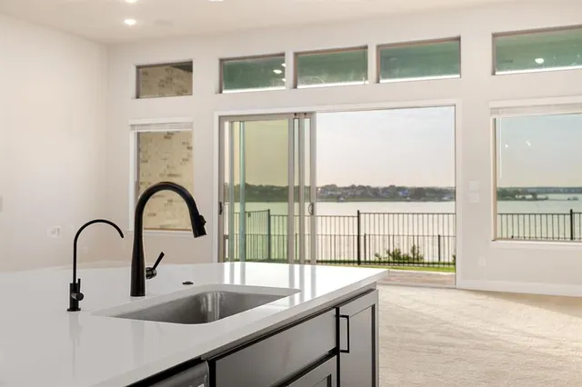 a view of a lake with couches in the ocean