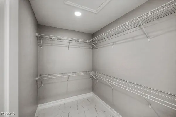 a bathroom with a shower and a toilet