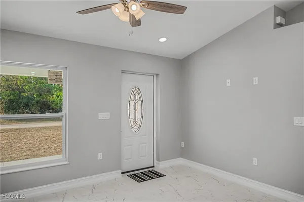 a view of a livingroom with furniture