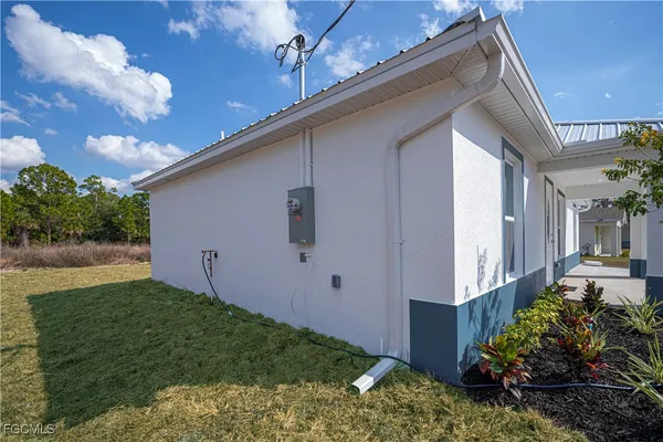 a backyard of a house with lots of green space