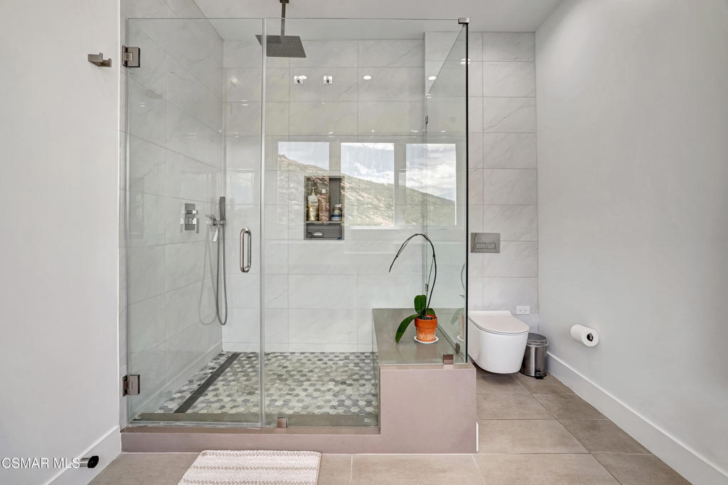 990 Alta Vista Road Simi Valley, CA 93063 - Photo 14 of 36 a bathroom with a granite countertop sink and a mirror