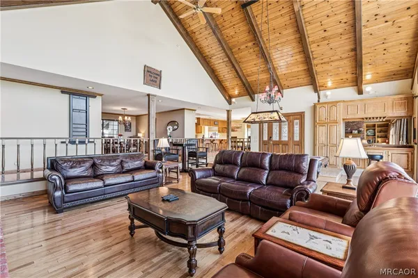 a kitchen with stainless steel appliances granite countertop a stove and a refrigerator