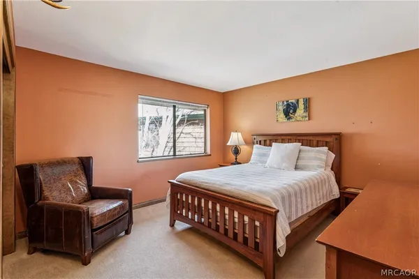 a bathroom with a sink vanity and mirror