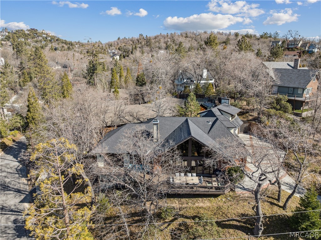 28994 North Shore Road Lake Arrowhead, CA 92352 - Photo 44 of 50 a view of a house with a yard and sitting area