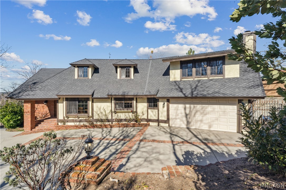 28994 North Shore Road Lake Arrowhead, CA 92352 - Photo 45 of 50 a front view of a house with a yard
